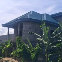 Modern home using structural tile profiles